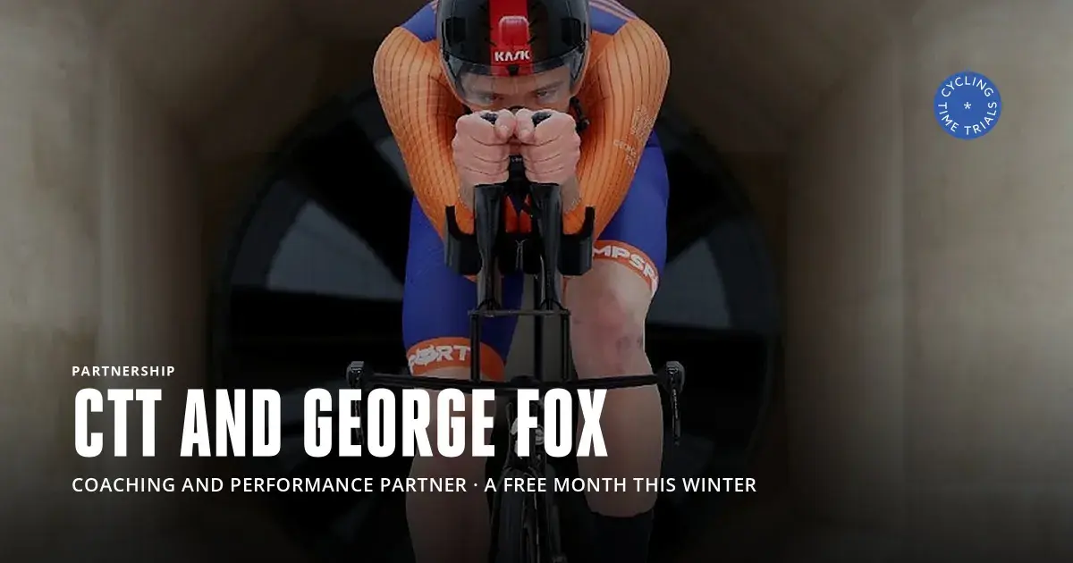 Time triallist on the aerobars in a wind tunnel, fan running behind
